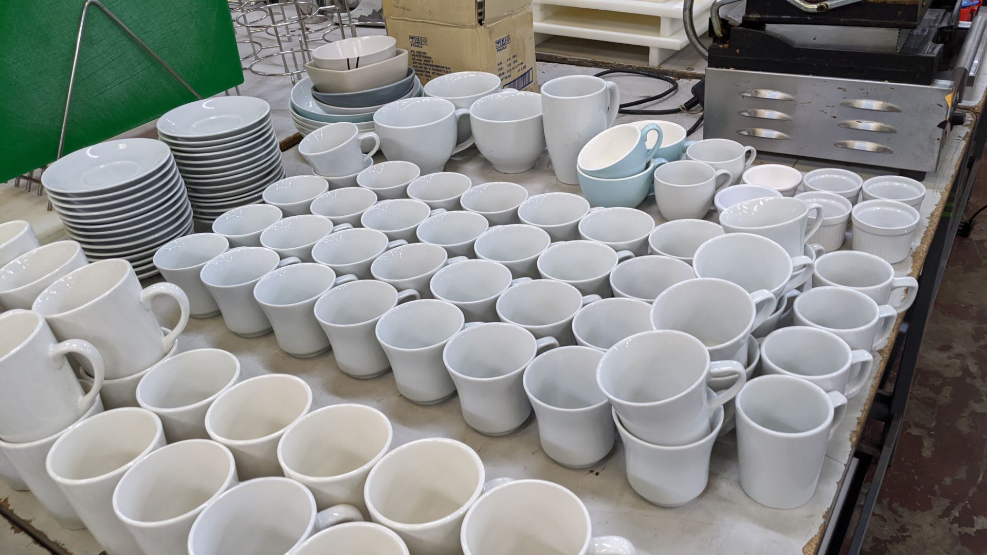 Large quantity of white crockery comprising oval & round plates plus saucers, bowls, cups, mugs & mo - Image 10 of 16