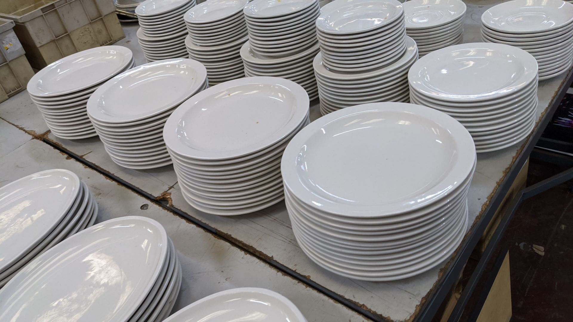 Large quantity of white crockery comprising oval & round plates plus saucers, bowls, cups, mugs & mo - Image 4 of 16