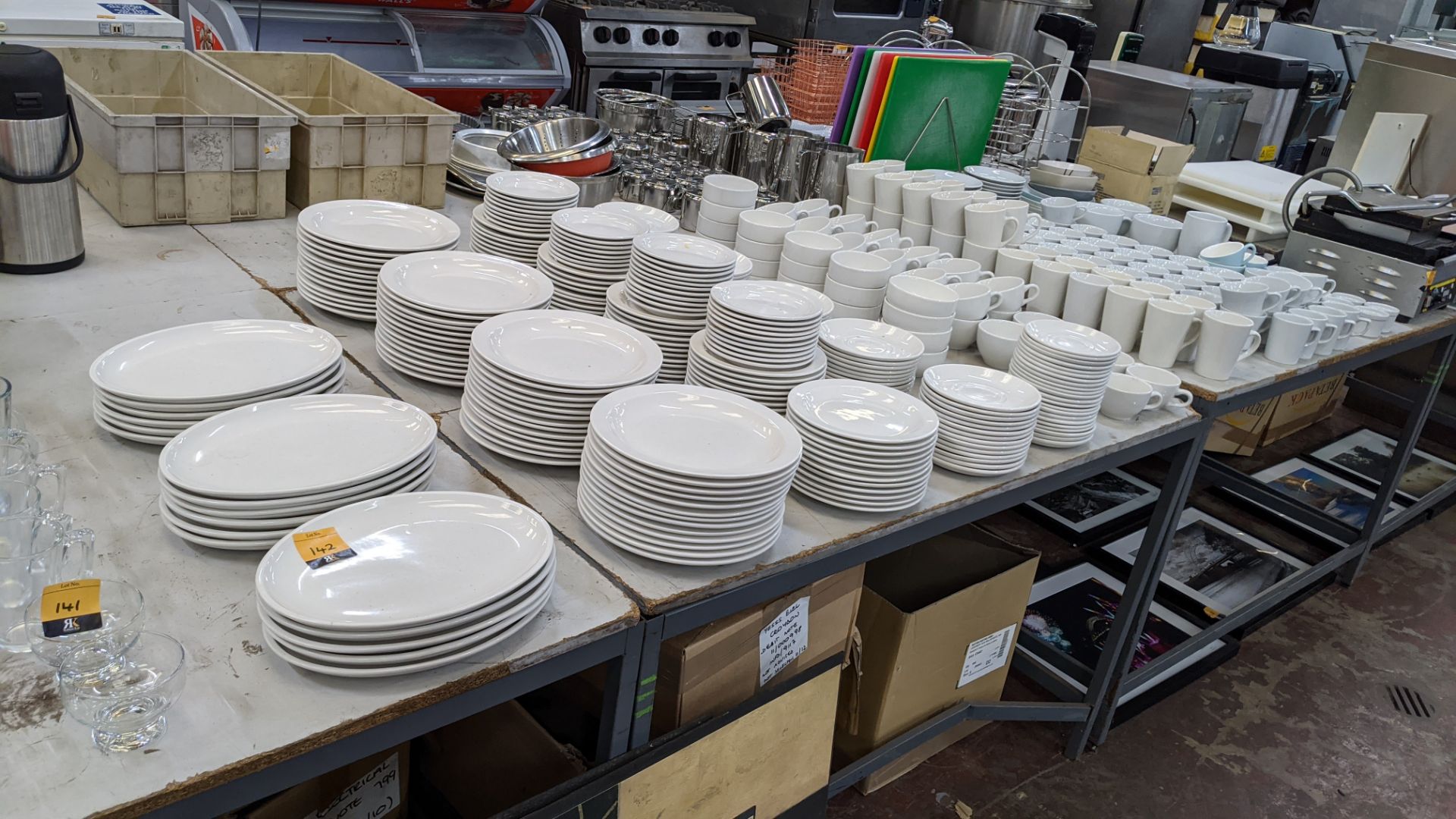 Large quantity of white crockery comprising oval & round plates plus saucers, bowls, cups, mugs & mo