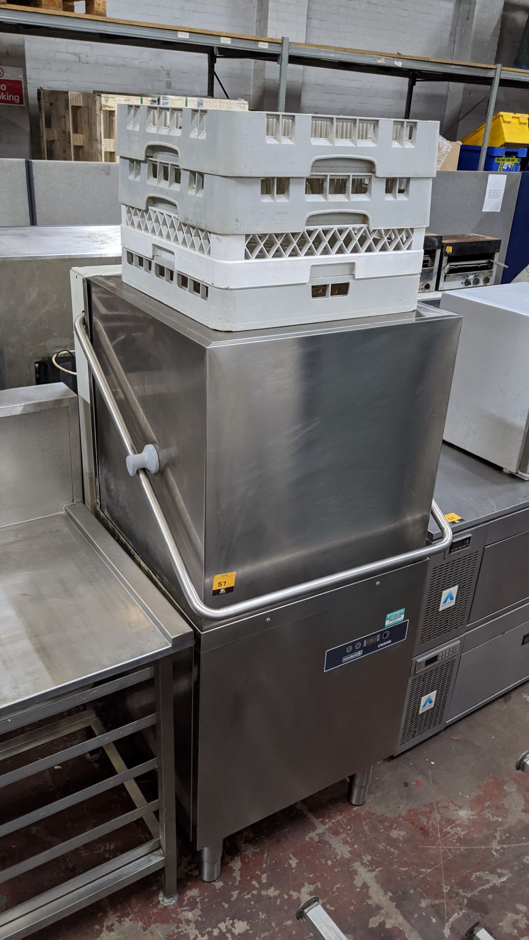 Maidaid model C1035WS commercial overhead pass through dishwasher including stainless steel side tab