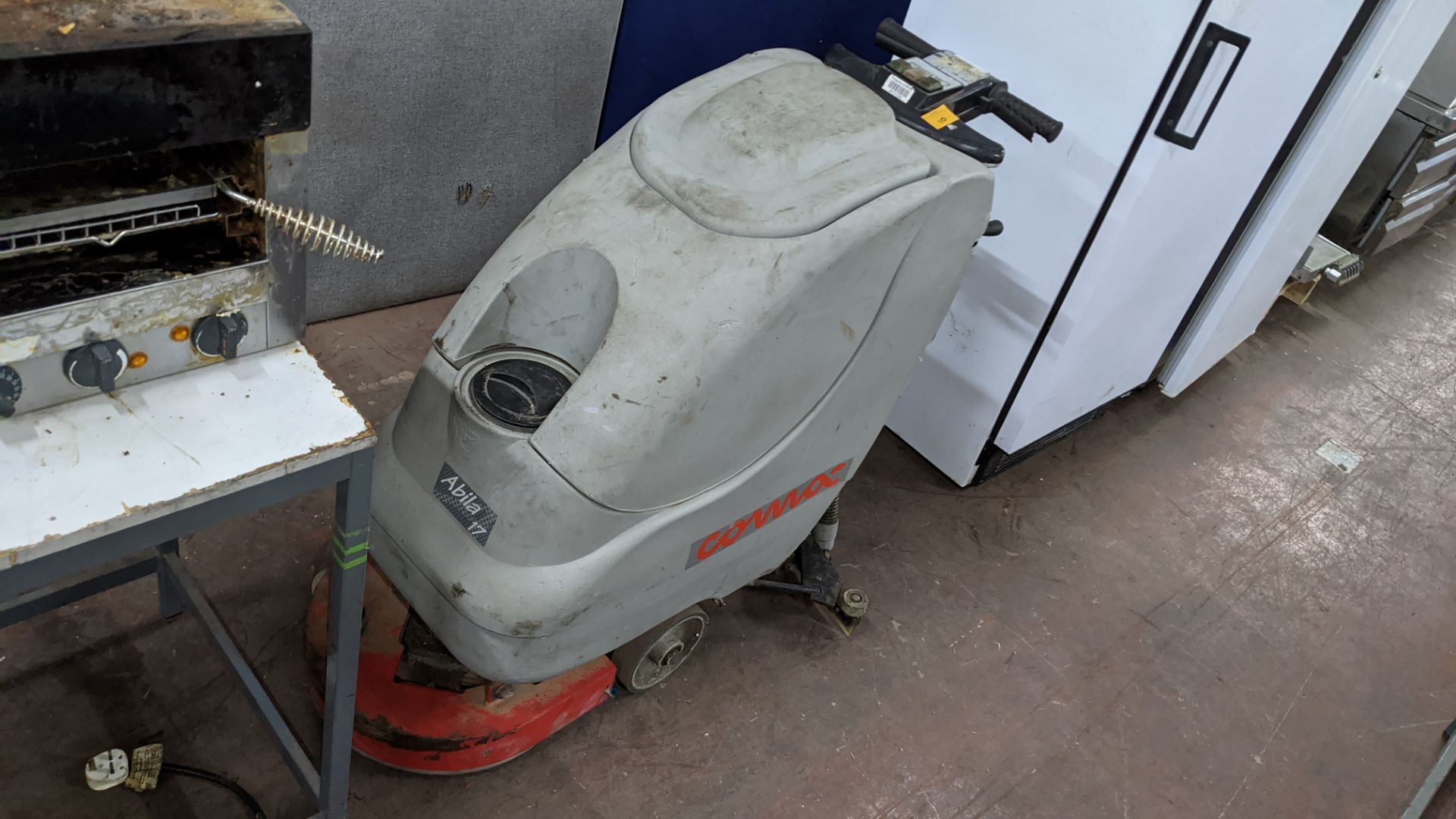 Comac electric floor scrubbing machine