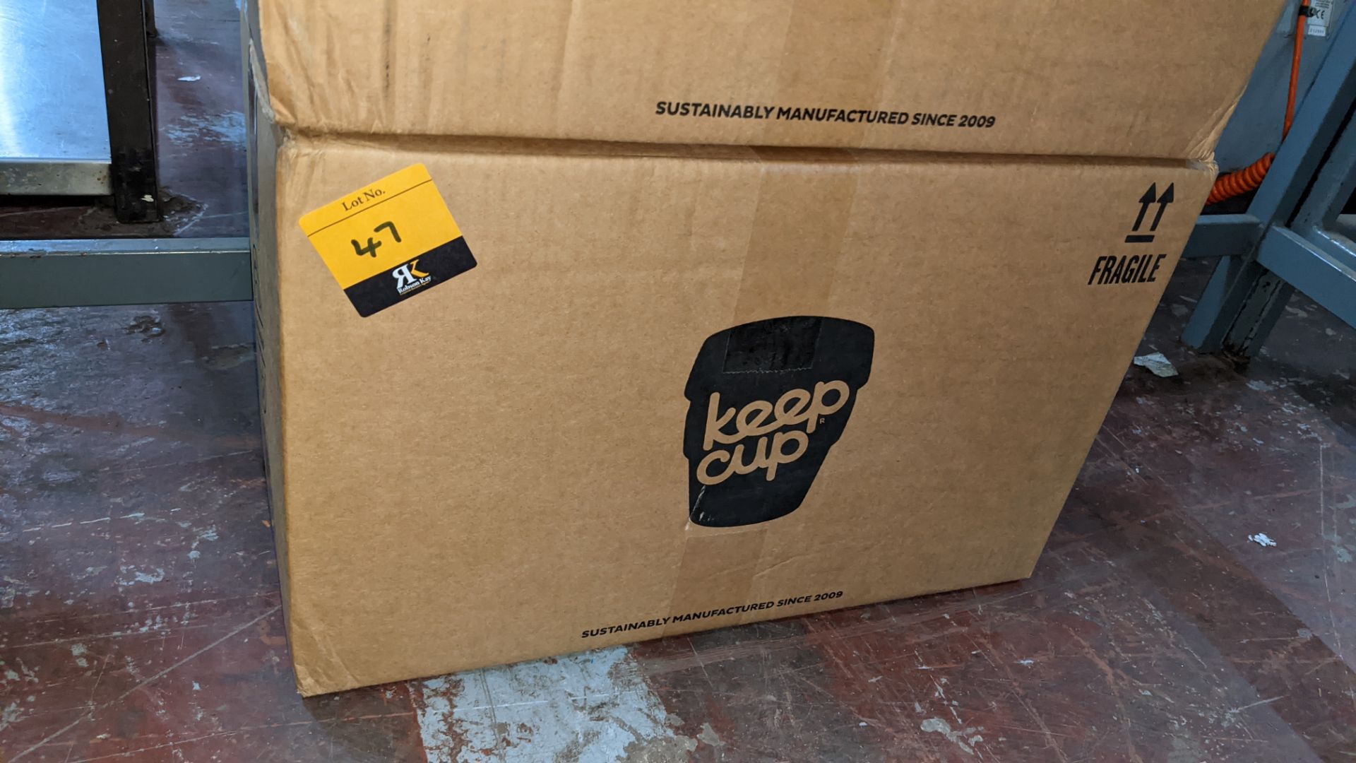 20 off Keepcup original reusable cup, size medium (12oz/340ml). Each unit is dark grey with a turqu