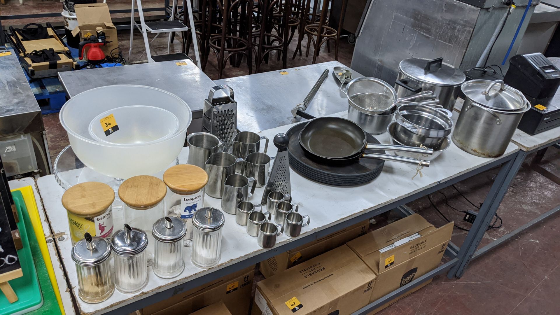 The contents of a table comprising jars, bowls, sugar dispensers, milk jugs, trays, strainers, pans - Image 2 of 5