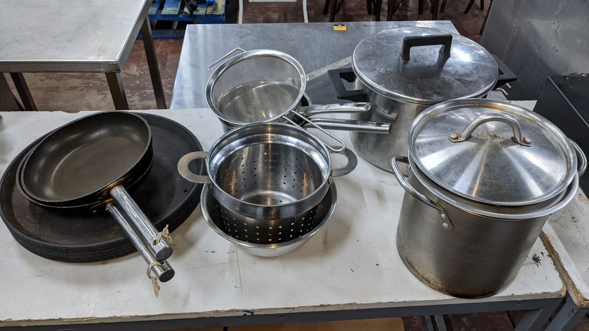 The contents of a table comprising jars, bowls, sugar dispensers, milk jugs, trays, strainers, pans - Image 5 of 5