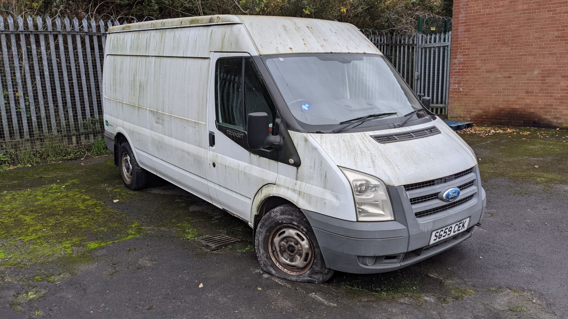 SG59 CEK Ford Transit 100 T350L RWD panel van, 2402cc diesel engine. Colour: White. First registered