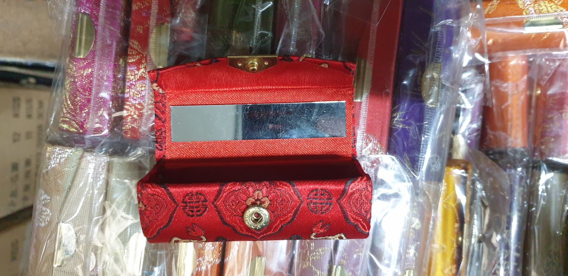 Approx. 360 assorted small decorative lipstick boxes each with a mirror in the lid, covered in a var