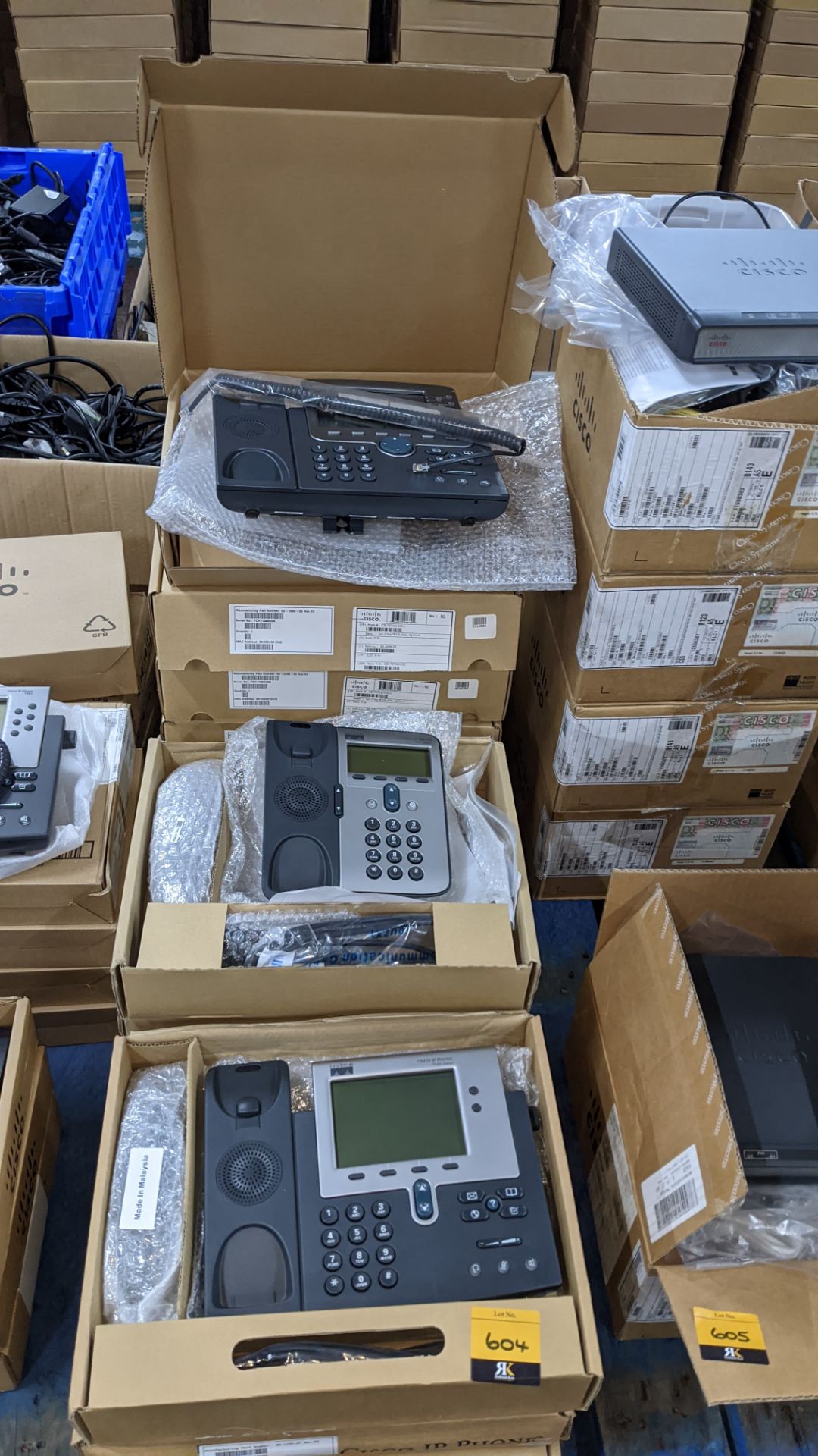 13 off Cisco handsets, model 7940, 7911 & 7971. Appear to be new & unused in Cisco branded boxes