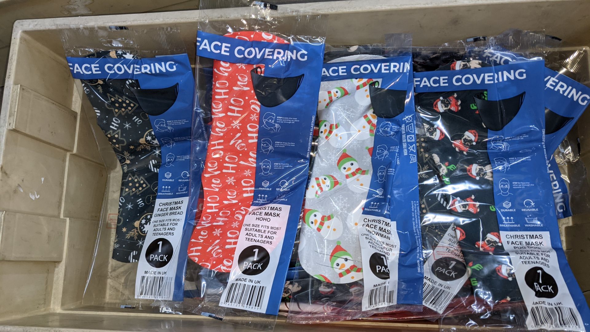 53 assorted Christmas design face masks, individually packed, marked as being one size fits most, su