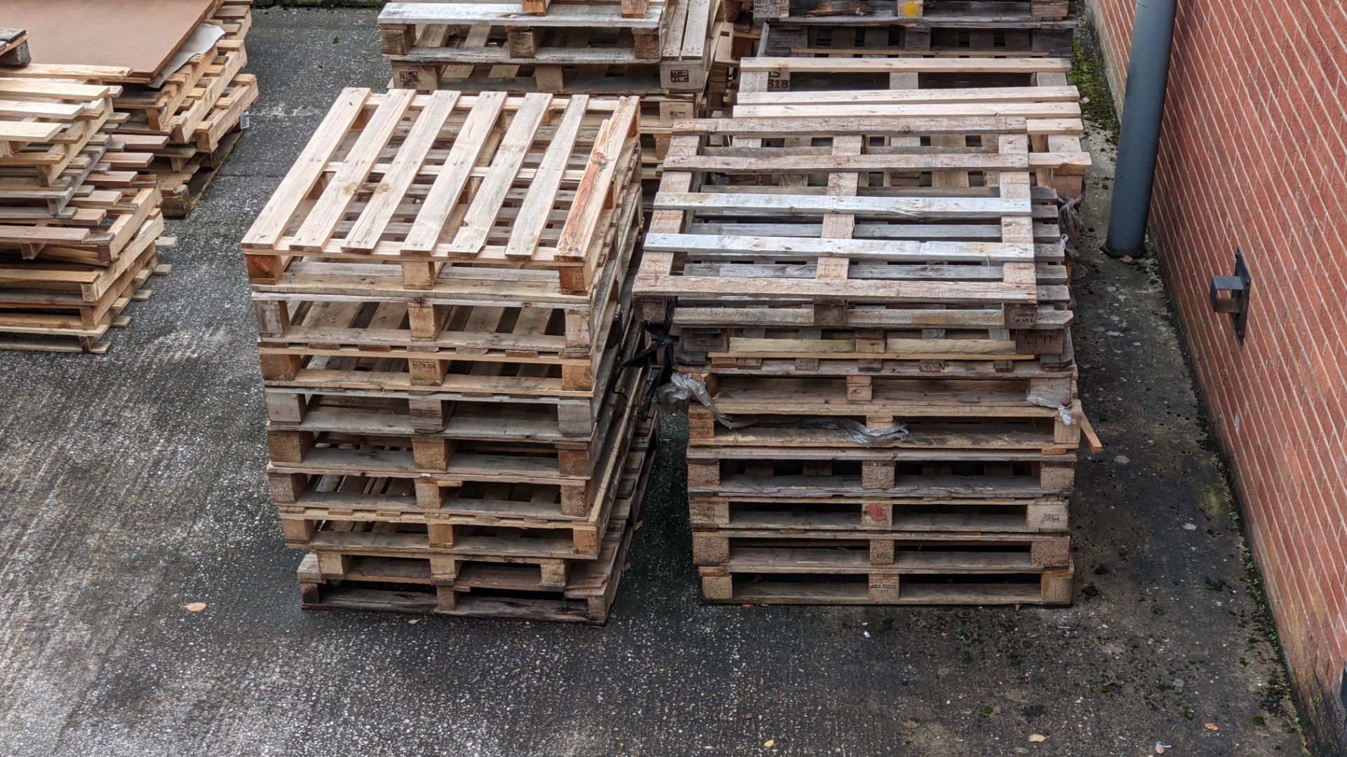 11 stacks of pallets, including regular size, euros, odd sizes and damaged. Approx 9-10 pallets per - Image 2 of 9