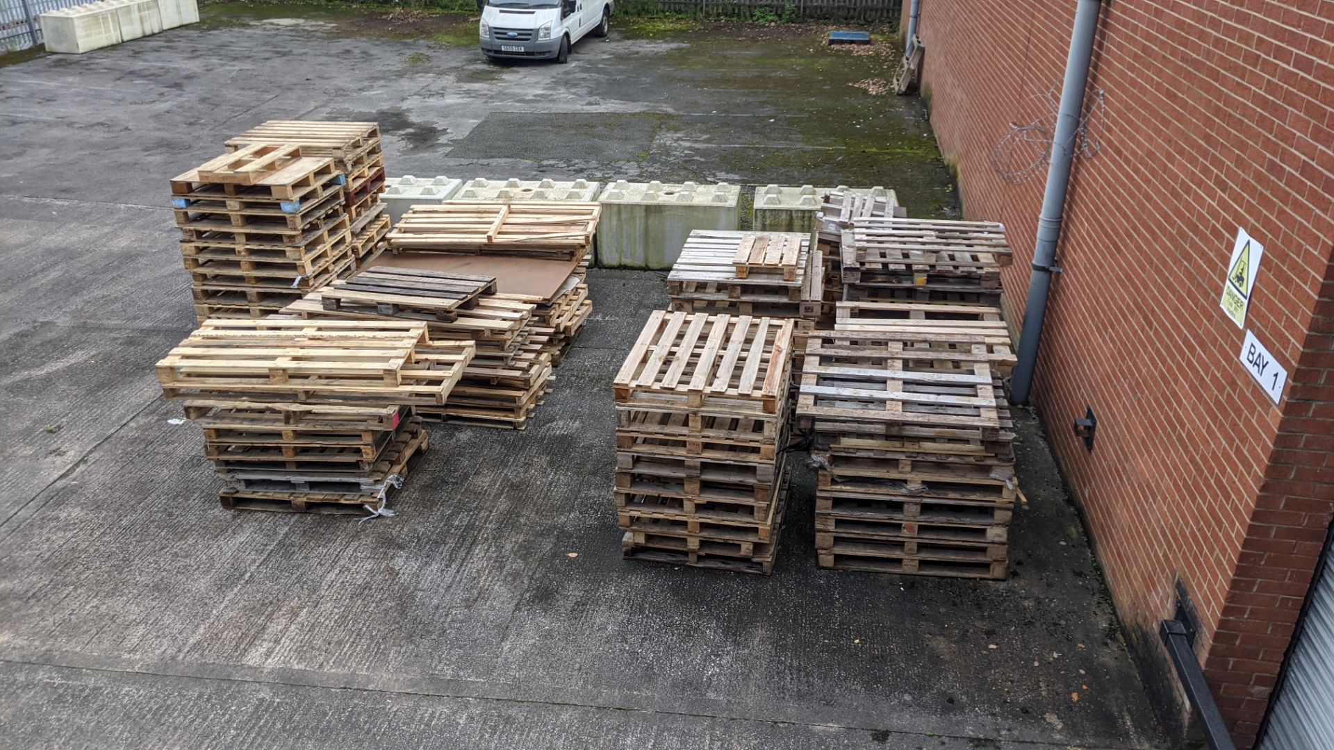 11 stacks of pallets, including regular size, euros, odd sizes and damaged. Approx 9-10 pallets per - Image 9 of 9