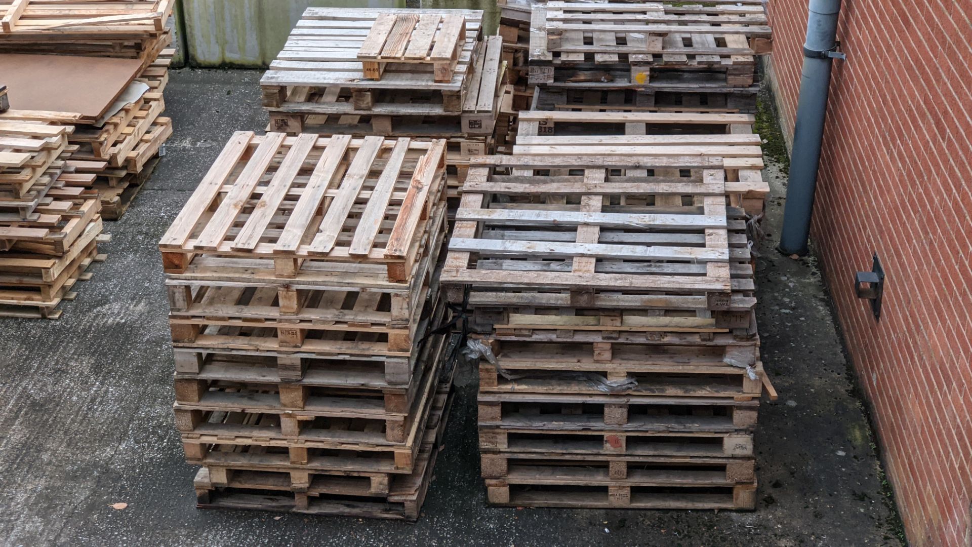 11 stacks of pallets, including regular size, euros, odd sizes and damaged. Approx 9-10 pallets per - Image 4 of 9