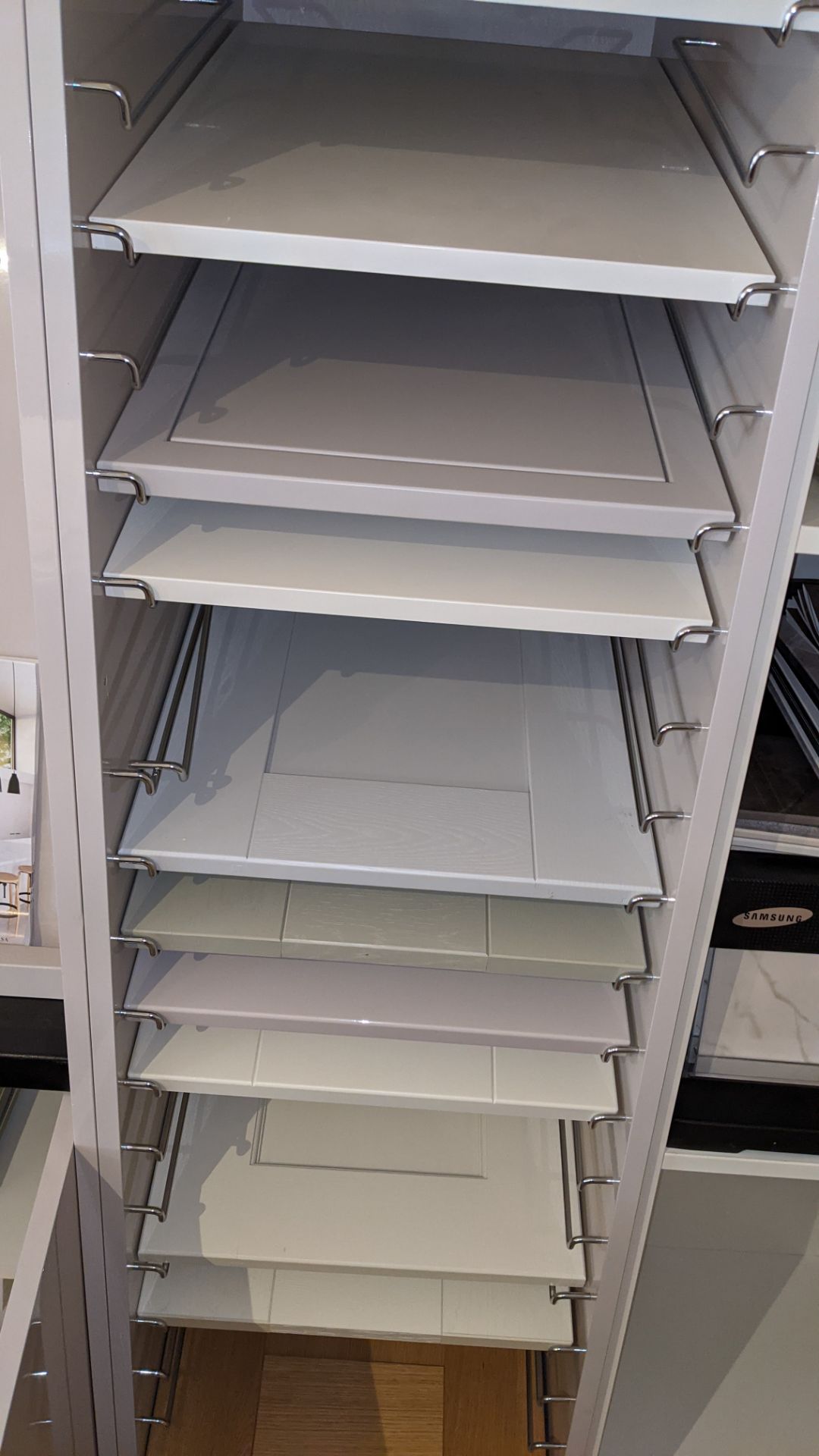 Large display unit in pale grey laminate including contents of assorted samples. This cupboard arran - Image 16 of 19