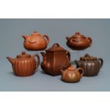 Six Chinese Yixing stoneware teapots and covers, 19th C.