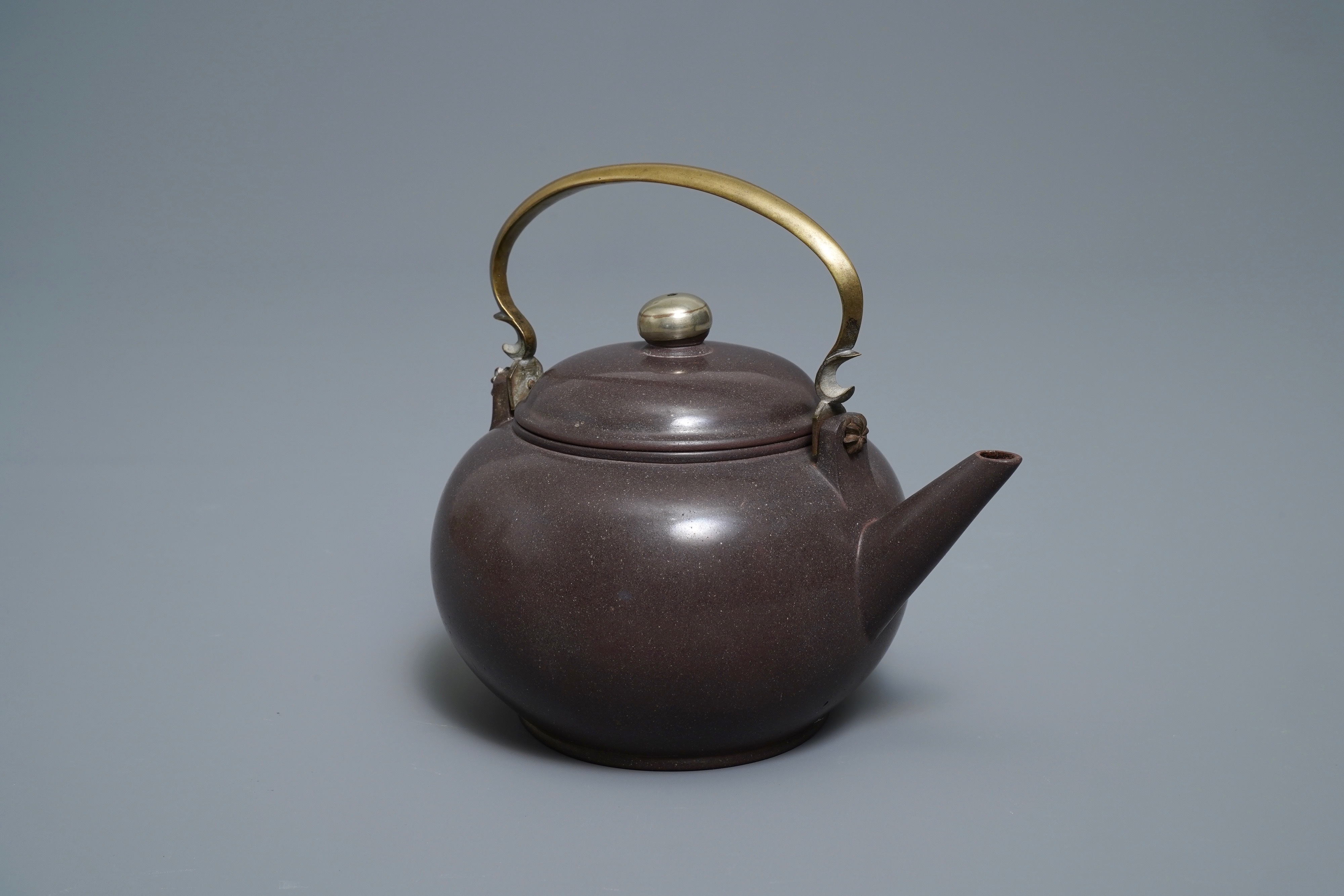 A Chinese Bencharong Thai market polished Yixing stoneware teapot, 19th C.