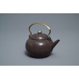 A Chinese Bencharong Thai market polished Yixing stoneware teapot, 19th C.