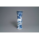 A Chinese blue and white gu vase with figurative design, Kangxi