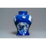 A Chinese blue and white powder blue-ground vase, Kangxi