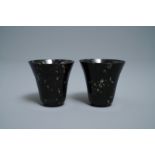 A pair of Chinese dark green jade wine cups, Qing