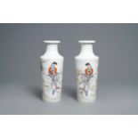 A pair of Chinese famille rose rouleau vases, four-character mark, 20th C.