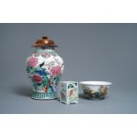 A Chinese famille rose vase, a brush pot and a famille verte bowl, 19th C.