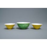 A pair of Chinese monochrome yellow bowls and a lime-green dragon bowl, Guangxu marks, 19/20th C.