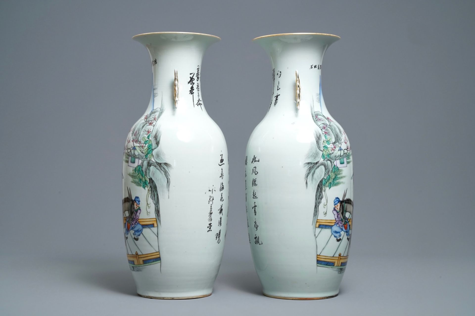 A pair of Chinese famille rose vases with travellers on a donkey, 19/20th C. - Image 2 of 6