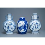 A pair of Chinese blue and white 'moonflask' vases and a covered jar, 19th C.