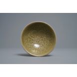 A Chinese yaozhou celadon bowl with floral design, Song