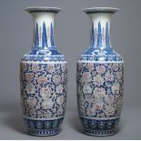 A pair of large Chinese blue, white and underglaze red vases, 19th C.