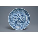 A Chinese Ming-style blue and white 'floral scroll' dish, Qianlong