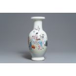 A Chinese famille rose 'immortals' baluster vase, Qianlong mark, 19/20th C.