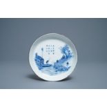 A Chinese blue and white Vietnamese market 'Bleu de Hue' dish with a river landscape, 19th C.