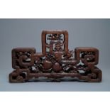 A Chinese finely carved wooden display stand, 19th C.