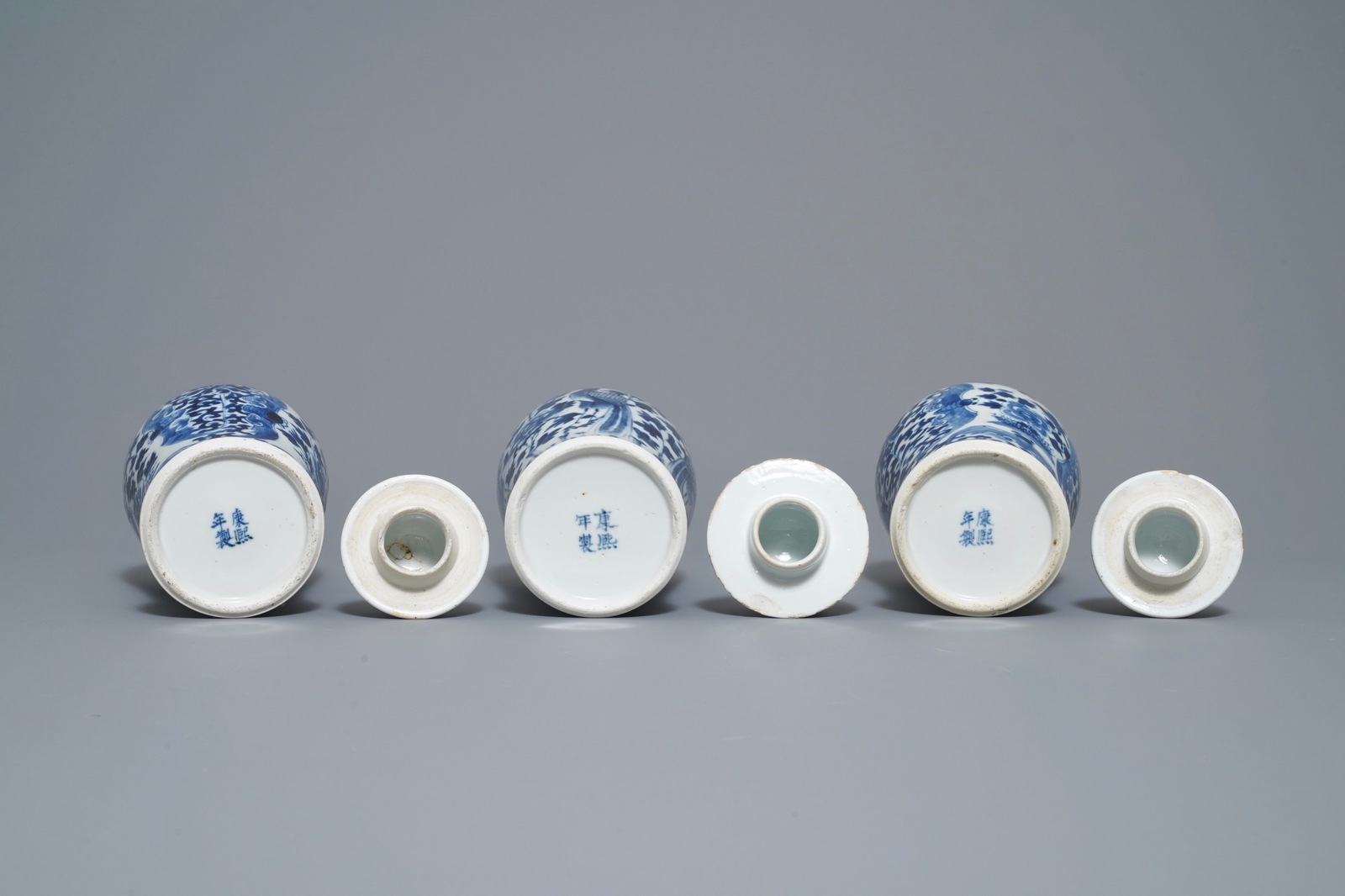 A Chinese blue and white five-piece garniture with peacocks, Kangxi mark, 19th C. - Image 6 of 8