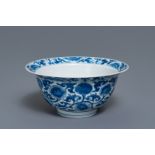 A Chinese blue and white bowl with floral scrolls, Kangxi