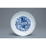 A Chinese blue and white dragon plate, Guangxu mark and of the period