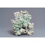 A Chinese jadeite carving of two cats among grapes and flowers, 20th C.