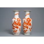 A pair of Chinese iron red 'Buddhist lions' vases, 19/20th C.