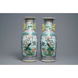 A pair of Chinese famille rose vases with birds among flowers, 19th C.