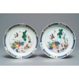 A pair of Chinese famille verte 'ducks in a lotus pond' plates, Kangxi