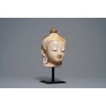 A gilt-lacquered alabaster head of Buddha, Burma, 19th C.