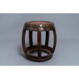 A Chinese carved hardwood stand with rootwood top, 19th C.