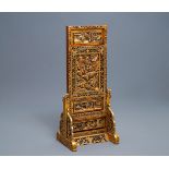 A Chinese gilt carved wood table screen for the Straits or Peranakan market, 19th C.