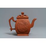 A Chinese Yixing stoneware teapot and cover, Jingxi Hua Feng Xiang Zhi mark, 18/19th C.