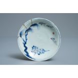 A Chinese blue, white and underglaze red plate with a horse and kintsugi repair, Tianqi