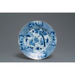 A Chinese blue and white dish with musicians in a garden, Kangxi