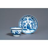 A Chinese blue and white 'mother with child' cup and saucer, Kangxi