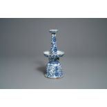 A large Chinese blue and white candleholder with floral design, Qianlong/Jiaqing