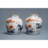 A pair of Chinese Imari-style 'qilin and phoenix' jars and covers, Kangxi