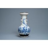 A Chinese blue, white and copper red Nanking crackle-glazed vase, 19th C.